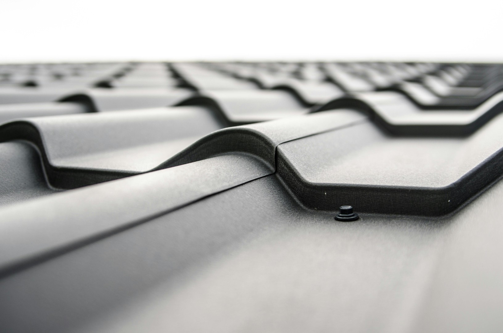 new metal cladding tiles on roof